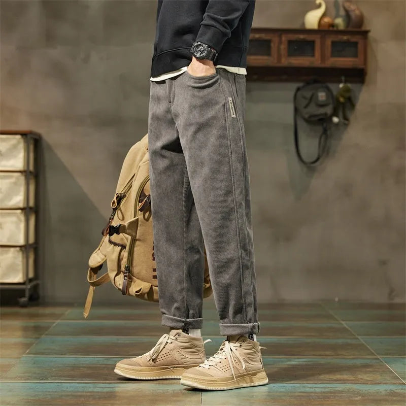 Men's corduroy casual trousers in tapered straight-leg design with street fashion styling