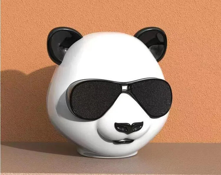 Compact classic-style portable mini Bluetooth speaker on a surface.