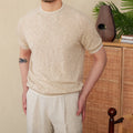 Brown linen cotton blend casual t-shirt with round neck and short sleeves on hanger