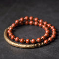 Layered retro ethnic bracelet with stone beads in water grass agate, obsidian, and red jasper colours