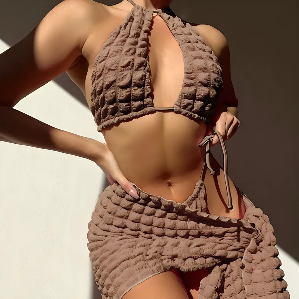 Brown seersucker three-piece women's bikini swimsuit with lace-up design on mannequin