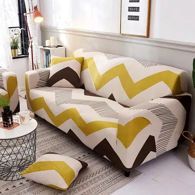 Geometric patterned stretch sofa slipcover fitted on a three-seater sofa