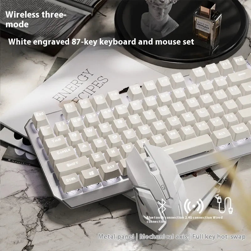 87-key wired mechanical keyboard with side-engraved keycaps, silver white finish, compact layout