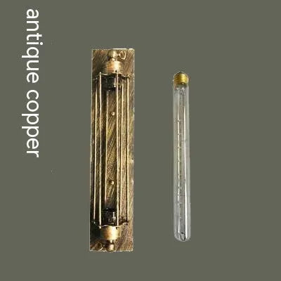 Industrial retro flute wall lamp in iron, shown in black finish on a brick wall.