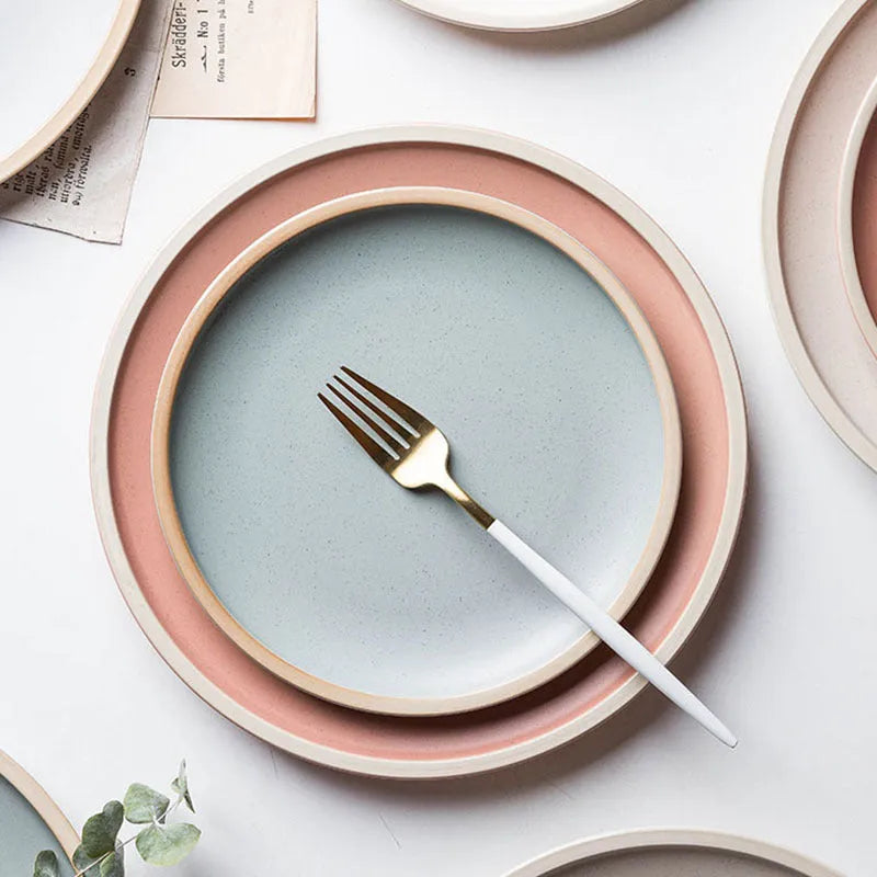 10-inch pure blue matte finish ceramic dinner plate on a table.