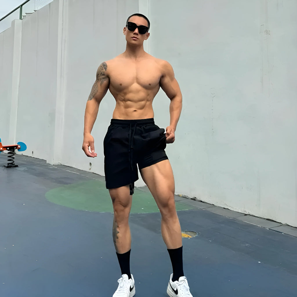 Men's ice silk quick-drying double-layer casual shorts in multiple colours on a size chart.