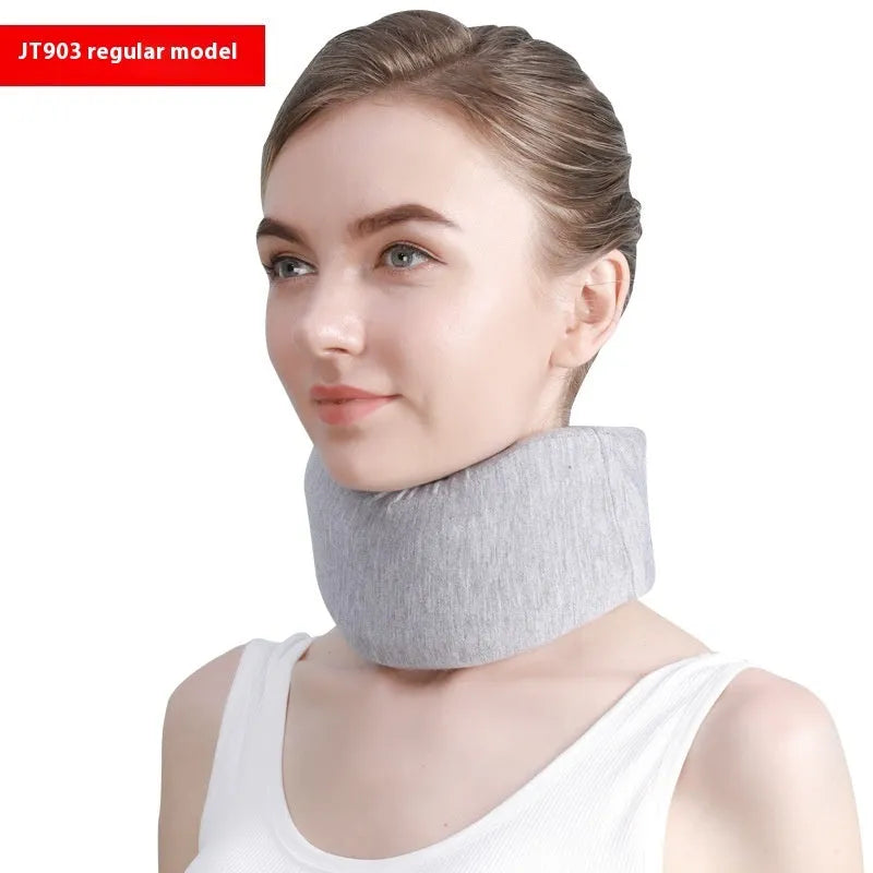 White PP plastic neck brace for cervical spine support shown on a grey background.