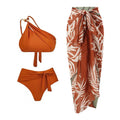 Women's brown push up high waist swimsuit with a split brief design and a sheer black chiffon dress overlay.