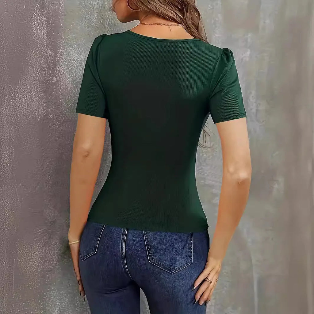 Women's wine red V-neck knitted short sleeve pullover top on a hanger.
