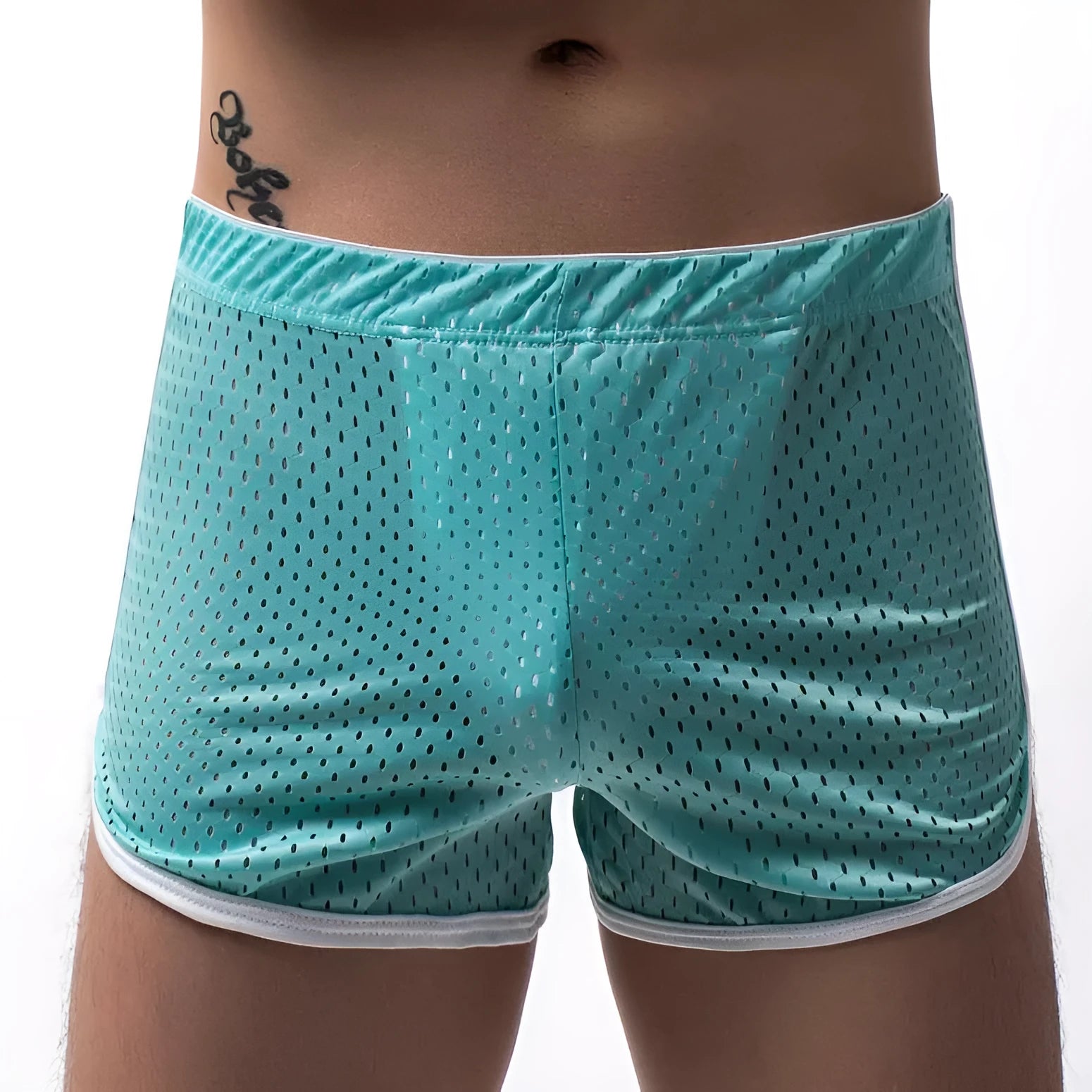 Men's grey cotton blend three-point boxer shorts laid flat, showing mid-waist design and knitted fabric texture.