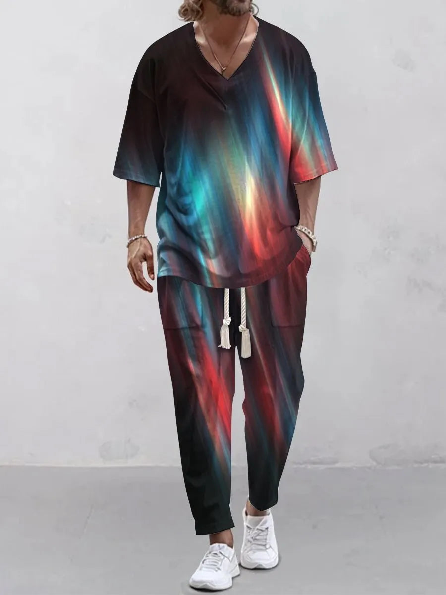 Cropped sleeve V-neck jacket and trousers suit in thin polyester fabric on a hanger.