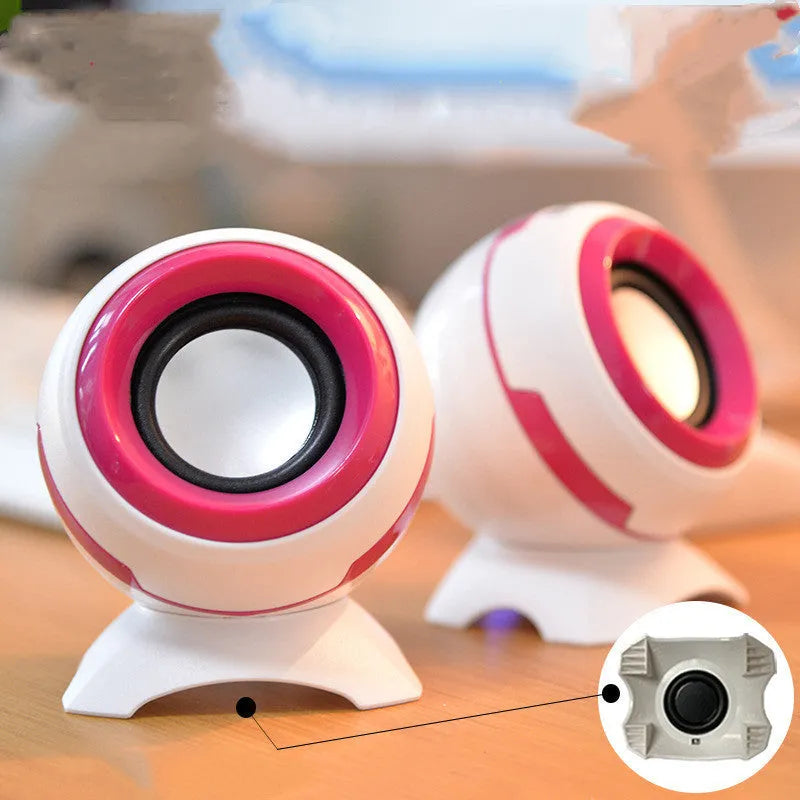 Compact black and gold USB-powered stereo desktop speakers for laptop and computer.