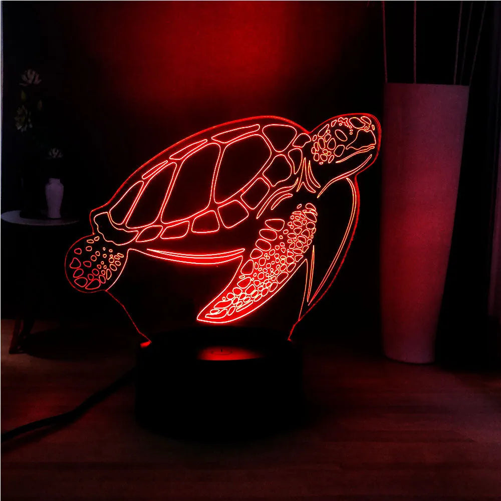 3D clear acrylic turtle-shaped LED night light with multi-coloured illumination.