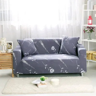 Geometric patterned stretch sofa slipcover fitted on a three-seater sofa