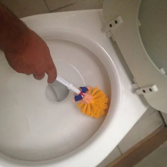 Yellow plastic Donald Trump toilet brush with 40cm length and hanging slot handle