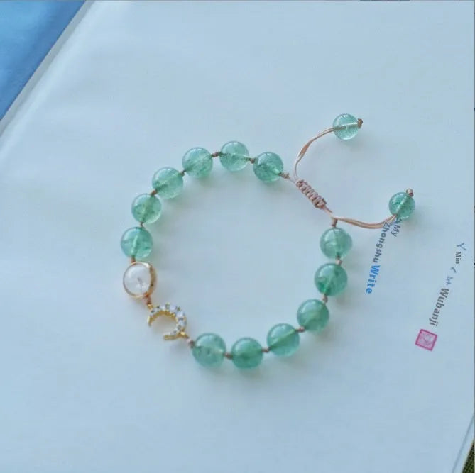 Handmade women's bracelet with Hetian jade and strawberry quartz crystals in peach blossom design