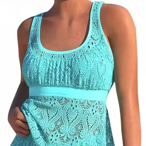 Women's solid colour two-piece swimsuit with sleeveless top and briefs for swimming sports.