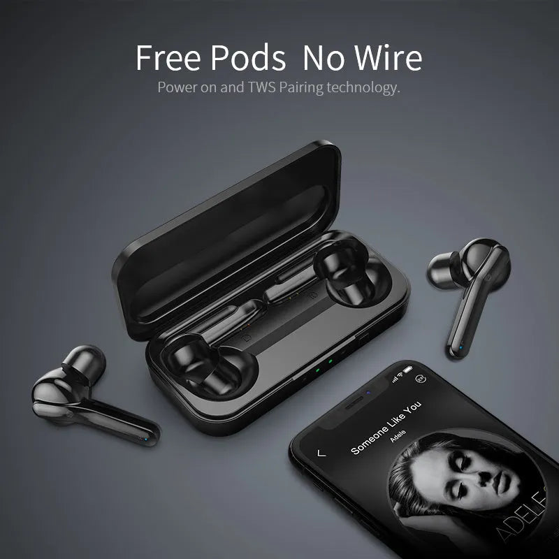Black and white true wireless stereo earbuds with a charging case on a table