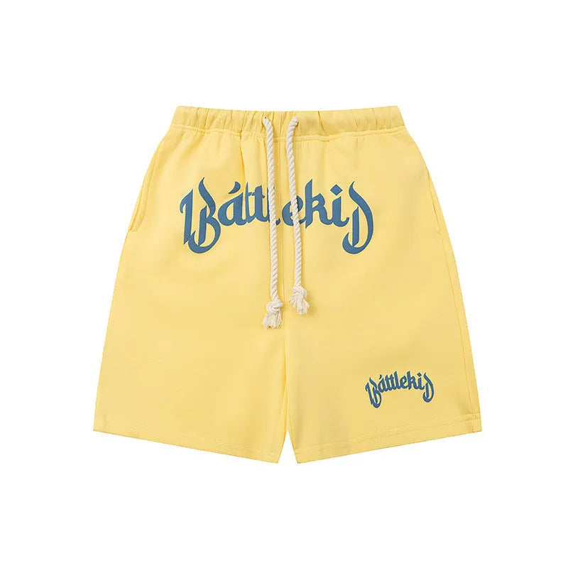 Loose grey cotton-blend street shorts with elasticated waist on a mannequin.