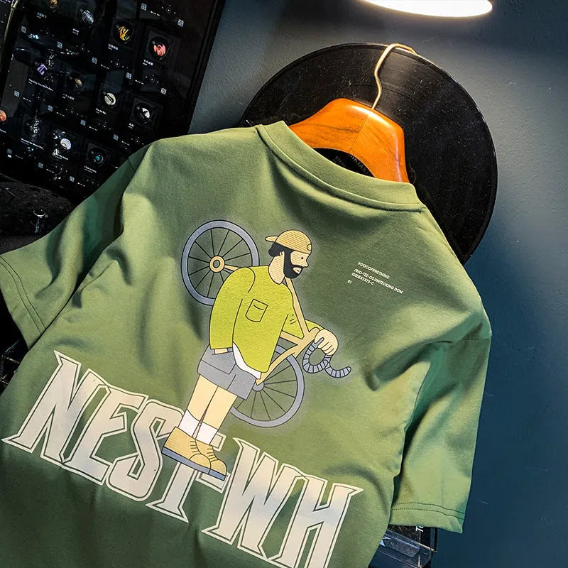 Green loose-fit men's short sleeve T-shirt with a printed design on the front.
