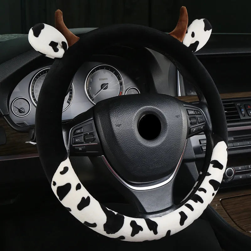 Short plush automotive steering wheel cover in black or coffee colour options showing soft fabric texture