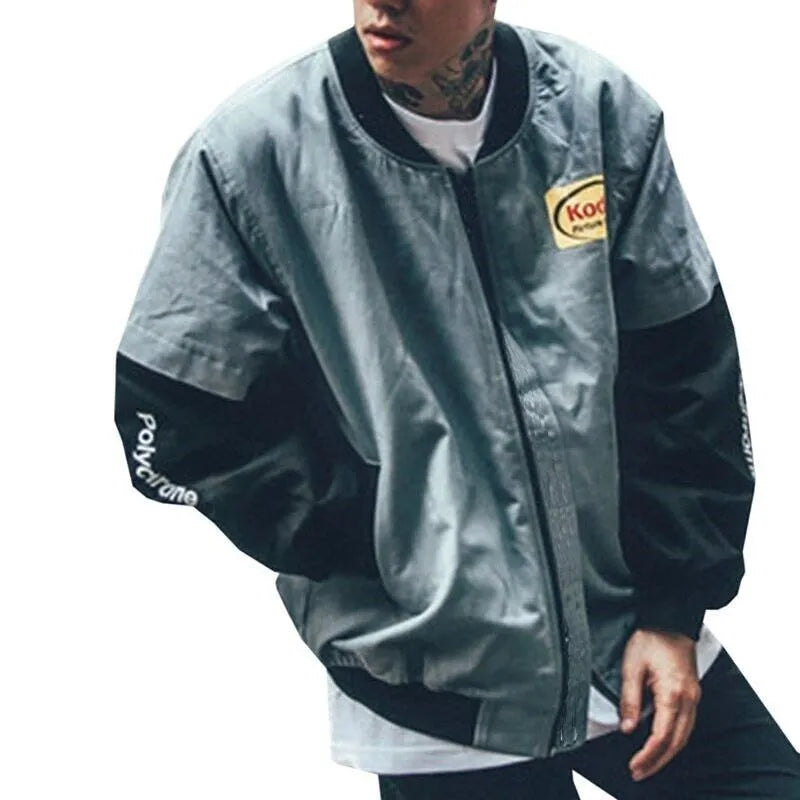 Hip hop style printed baseball jacket in Grey with round neck and side slit pockets on a model