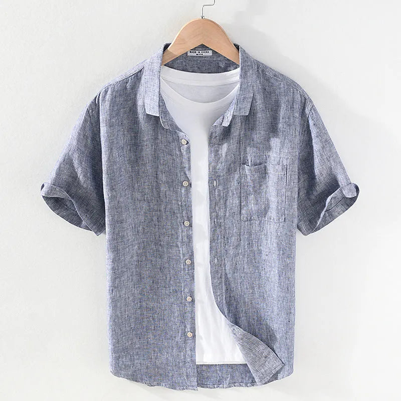 Men's square collar short sleeve linen shirt in raw jute colour, laid flat.