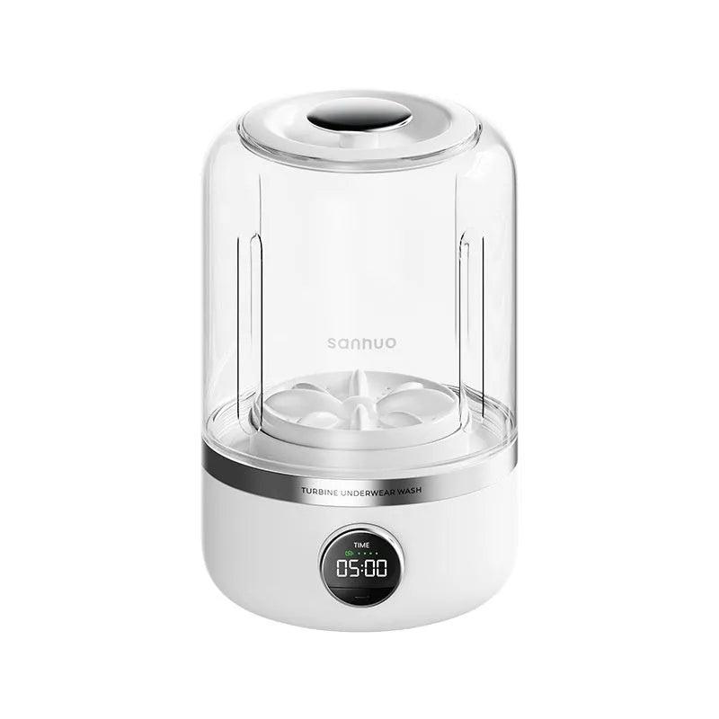 White portable laundry cup rechargeable small washing machine with charging cable on a table