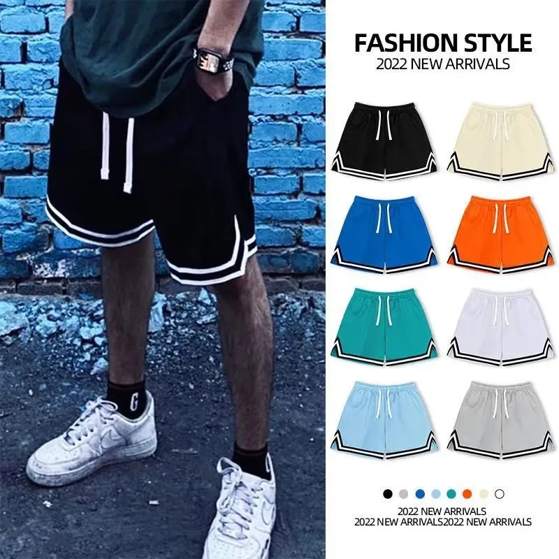 Men's loose-fit polyester sports shorts in various colours on a size chart.