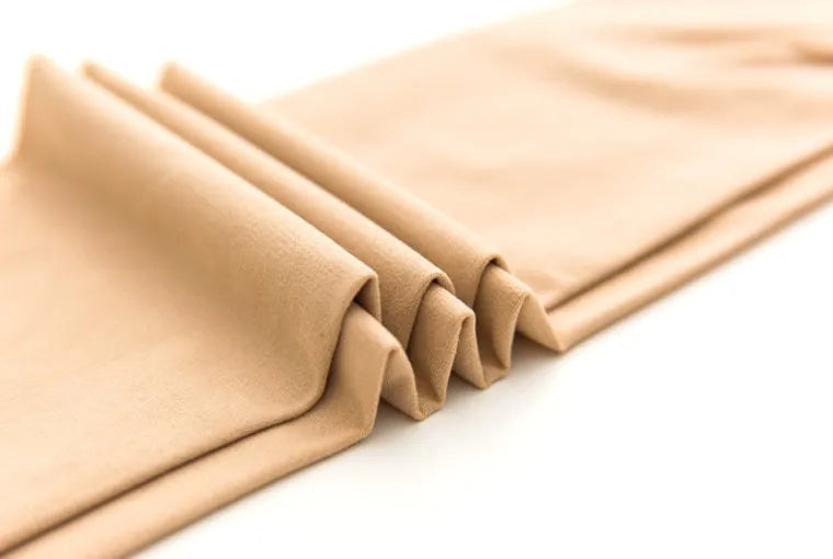 Beige stovepipe compression socks for abdomen and hip lifting shapewear