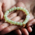 Green Hetian jade bracelet with vintage beads in ethnic style design for women