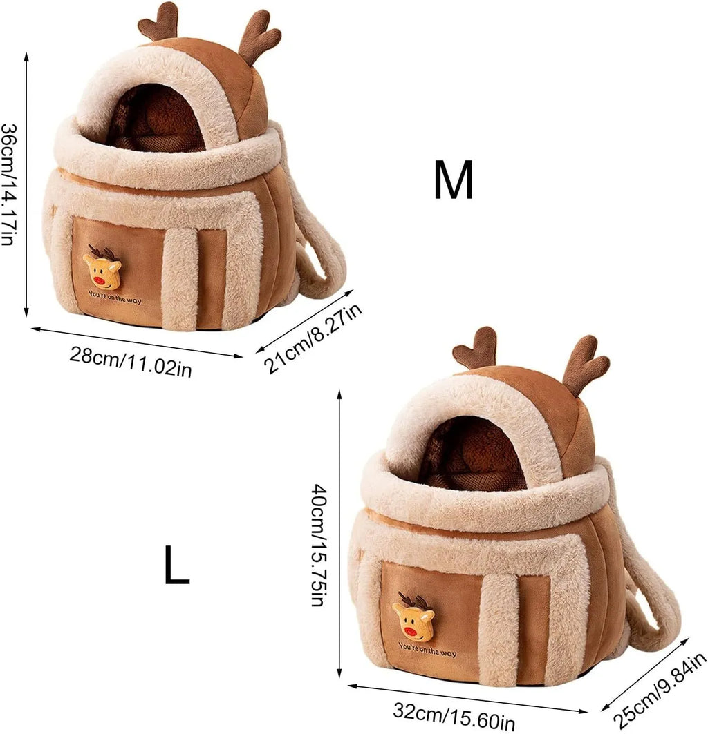 Plush reindeer pet carrier backpack with hand warmers in medium size for winter dog travel