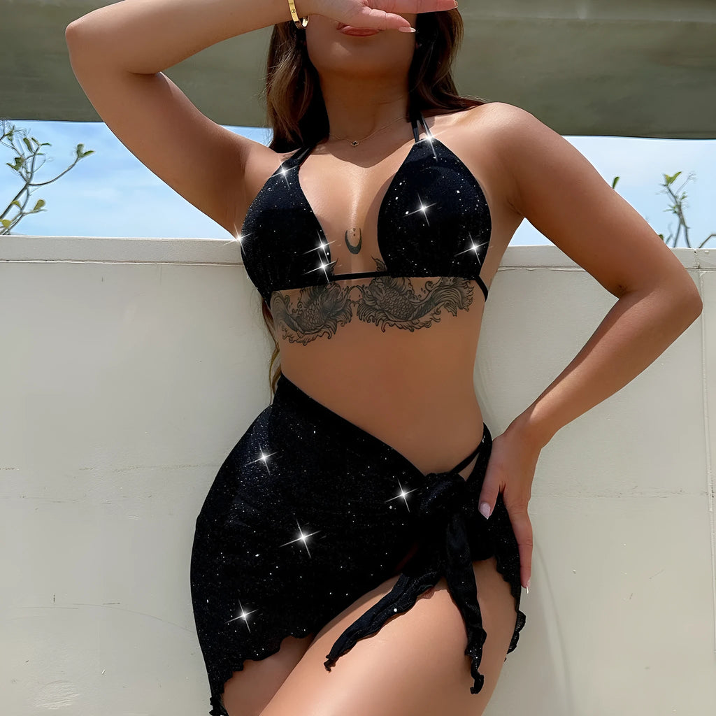 Black women's three-piece fission bikini set with top and shorts on a mannequin.