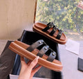 Women's Roman sandal slippers in patent leather with sheepskin upper, available in three colours