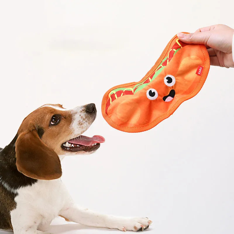 Colourful crinkle and squeak dog toy in a fast-food burger shape on a white background.