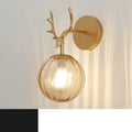 Modern round glass wall sconce with a Nordic design, mounted on a white wall, showing its light-diffusing shade and compact 30cm diameter.
