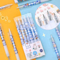 A pack of six colourful bear and rabbit character press pen knives on a white background.