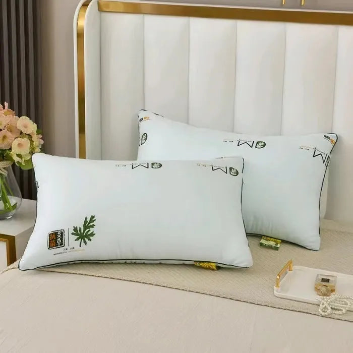 A white polyester fibre bedding pillow core on a bed, with size and weight options shown for 48x74cm and 42x70cm.
