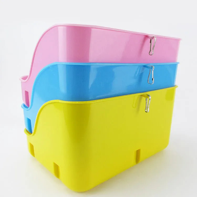 Large rectangular rabbit toilet in blue, measuring 30cm by 22cm by 16cm, with a shovel and garbage bag beside it on a surface
