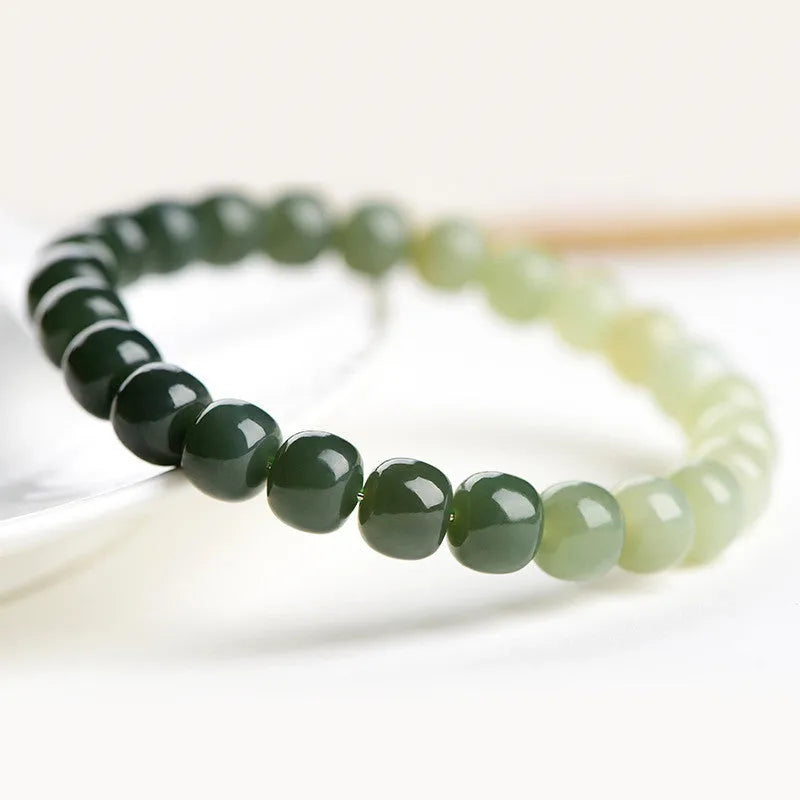 Hetian jade bracelet with sunny water gradient colour on wrist