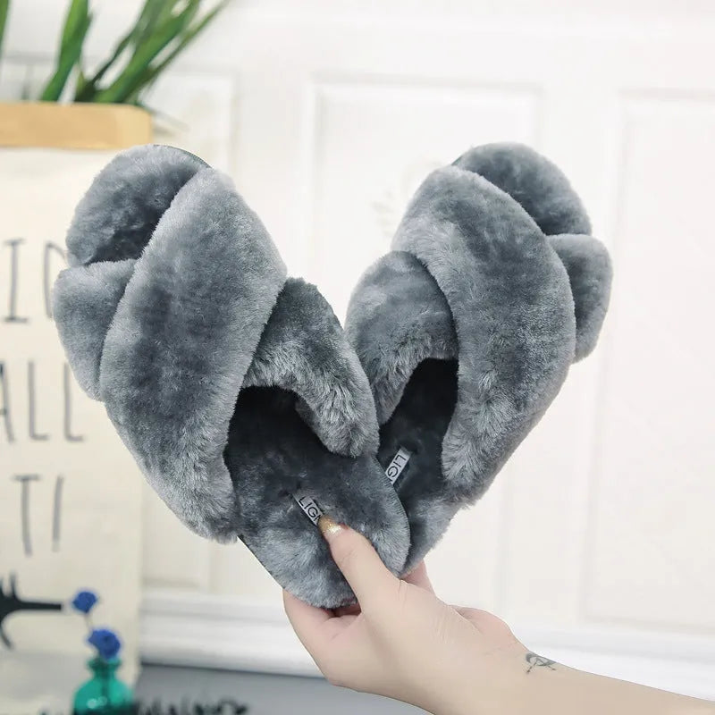 Cross open-toe fur slippers in black with a patterned non-slip rubber sole.