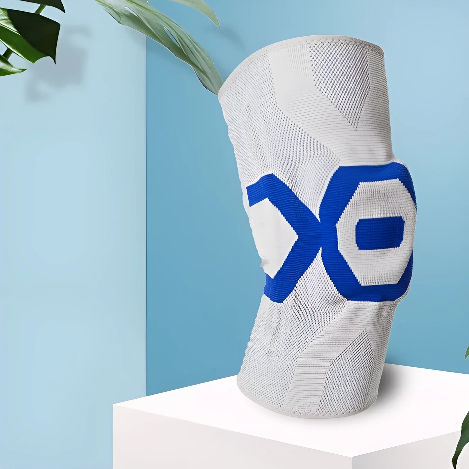 Men's silicone knee pads for sports in black and blue, shown from a front view.
