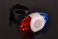 Red and blue LED equipment tail light with adjustable base showing horizontal and vertical placement options