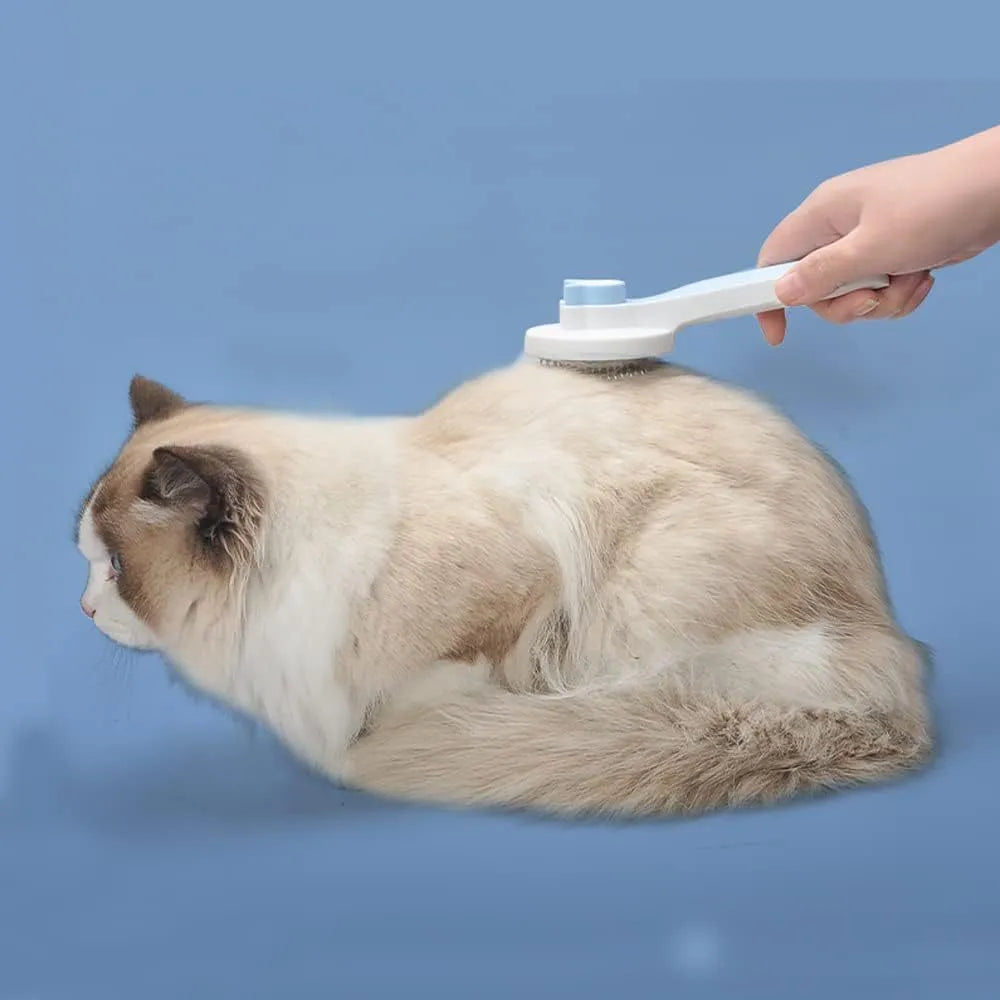 Blue self-cleaning cat grooming brush with one-click button and rubber-tipped needles