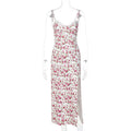 Blue women's long dress with white lace flower print, side slit, and thin suspender straps.