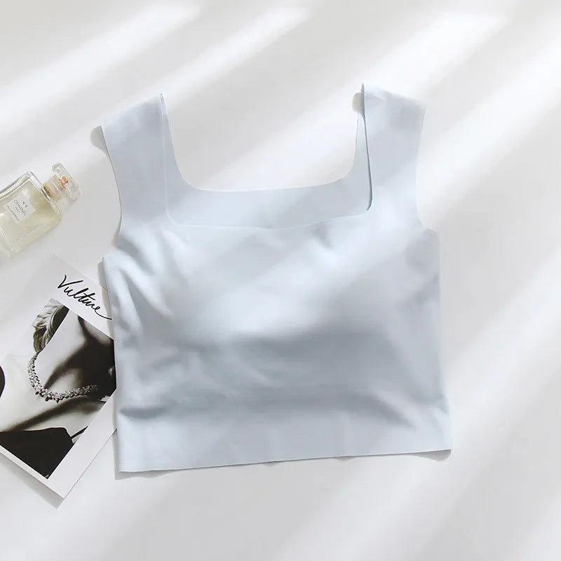 Women's seamless non-marking sling vest with thin mould cup in light blue.