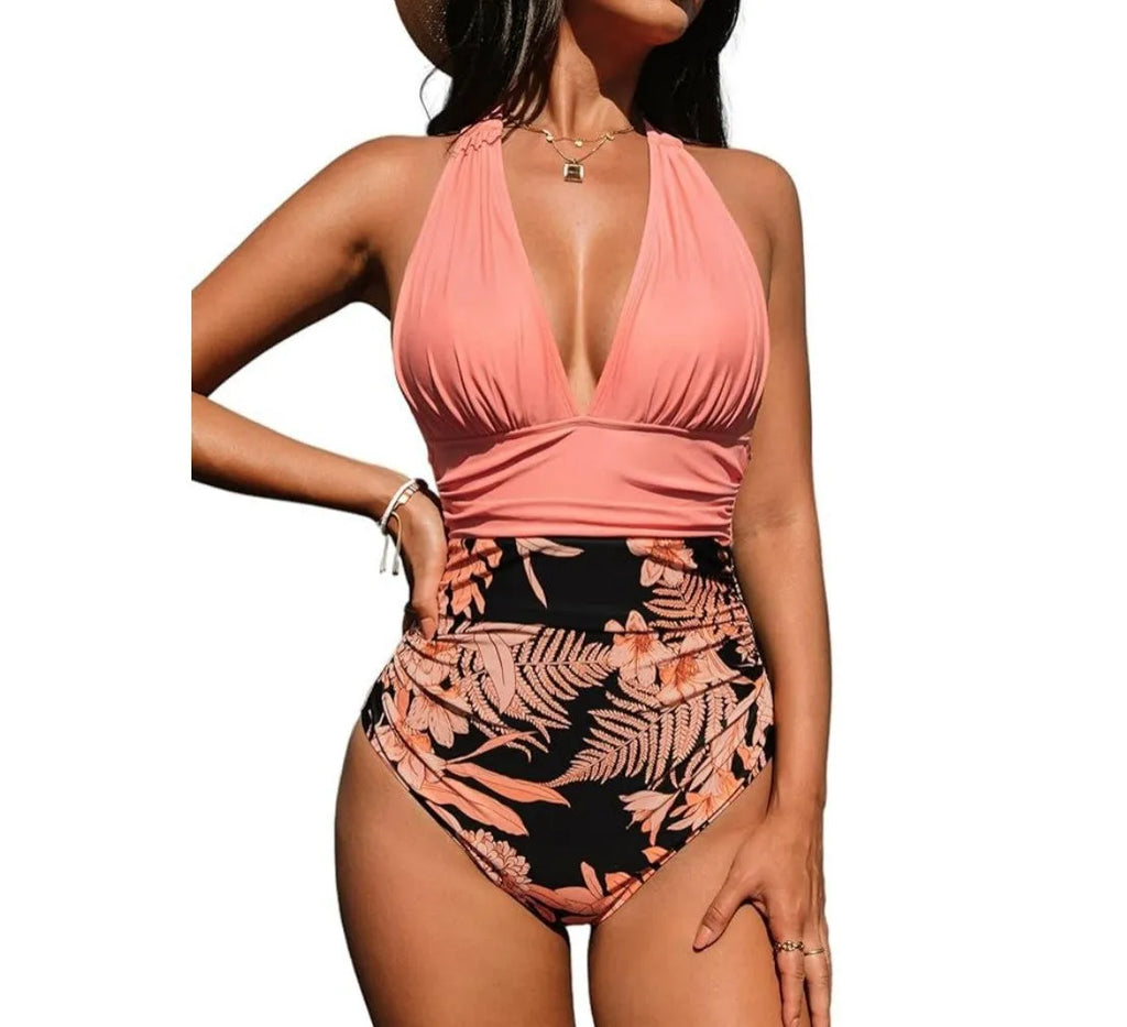 Women's backless halter one-piece swimsuit in a floral print pattern.