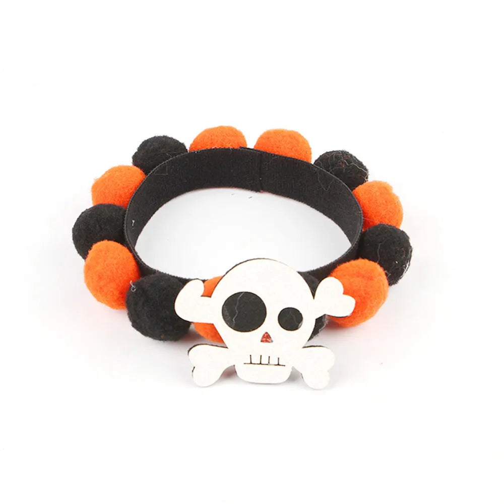 Halloween pet collar with fur ball decoration in pumpkin design on dog neck