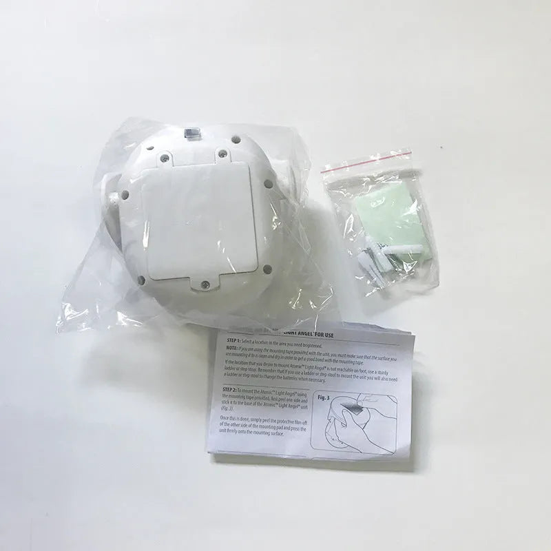 White Atomic Angel induction night light with ABS plastic housing and decorative angel design