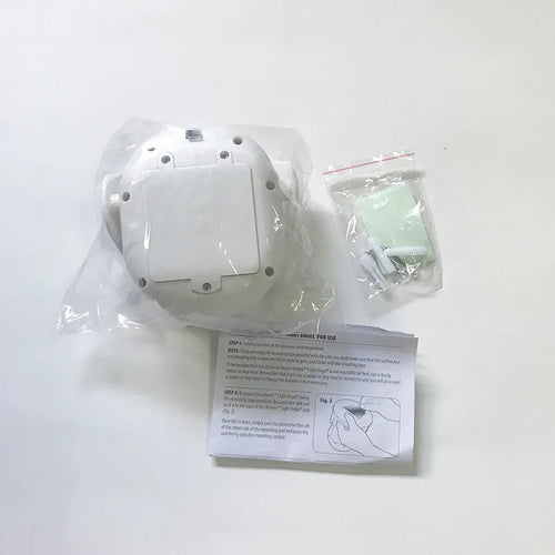 White Atomic Angel induction night light with ABS plastic housing and decorative angel design